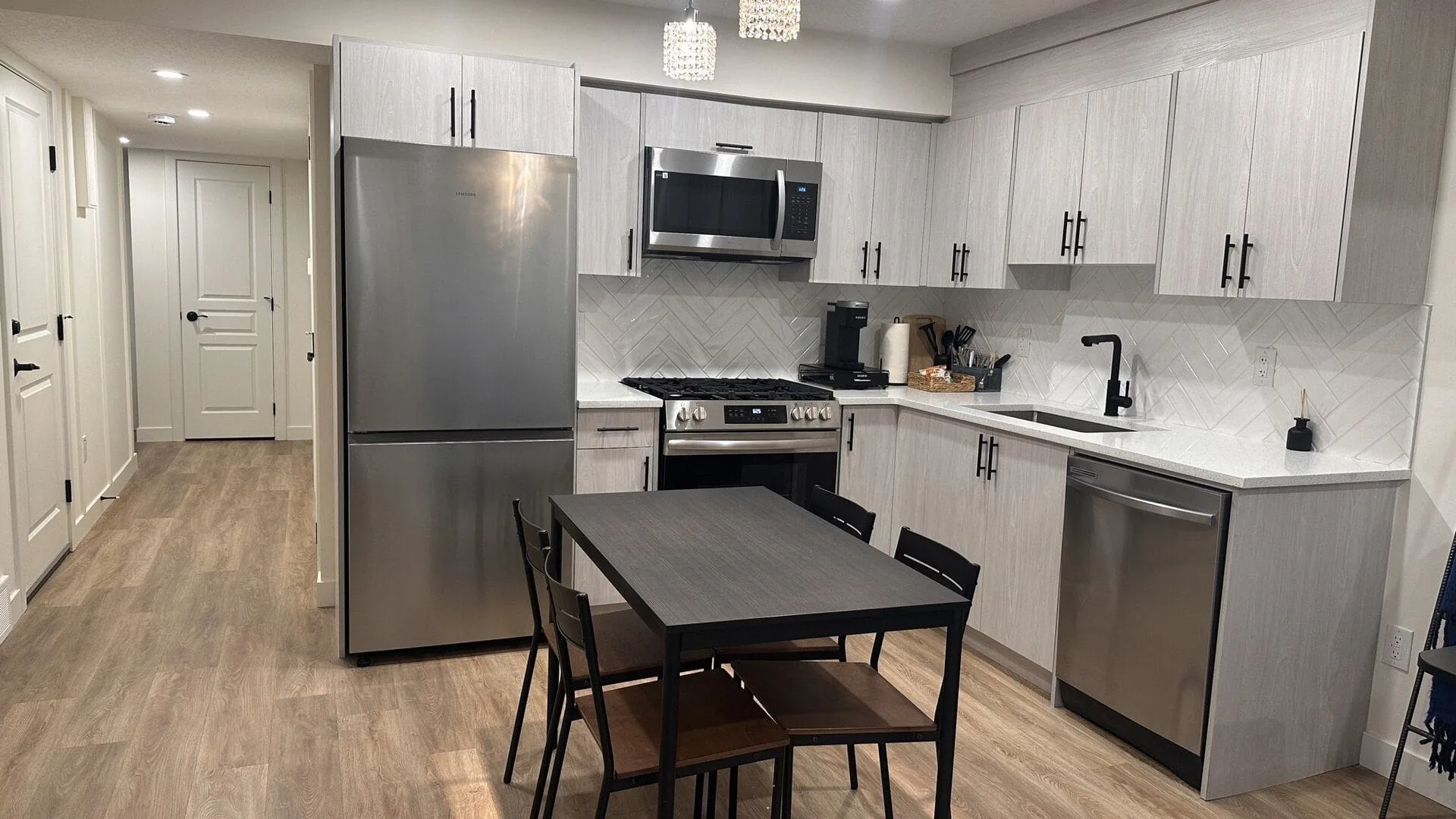 Finished legal suite conversion by OAF Construction in northwest Calgary