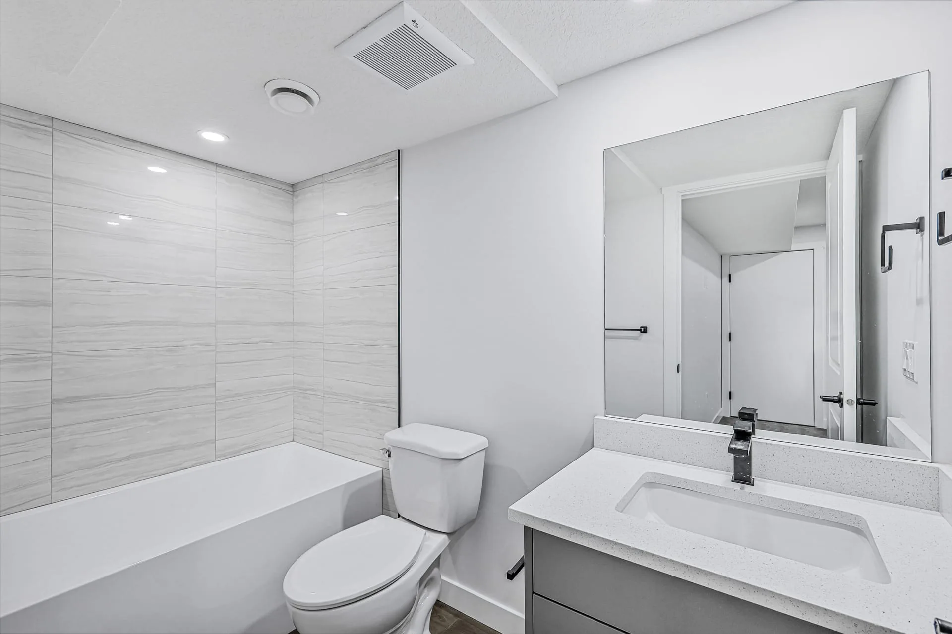 Finished Calgary legal basement suite kitchen built by OAF Construction.